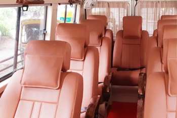 9+1 seater deluxe 1x1 maharaja tempo traveller hire