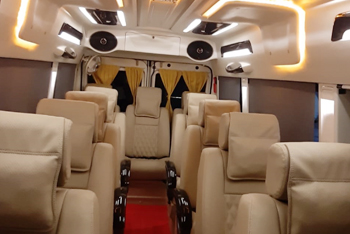 12 seater deluxe 1x1 maharaja tempo traveller hire