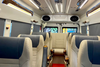 8 seater deluxe 1x1 maharaja tempo traveller with sofa seating hire in delhi